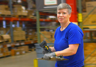 Distribution employee with a clipboard